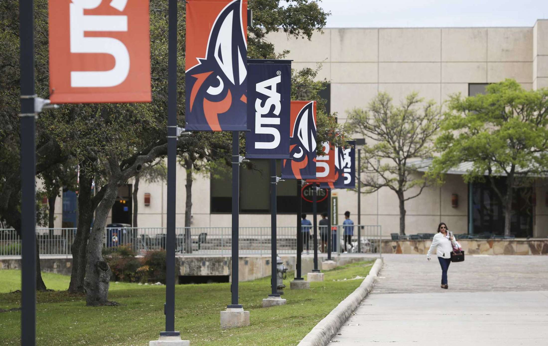 Student walking on UTSA Campus